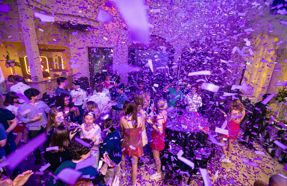 Confetti falling over a packed prom dance floor at The Bell Tower on 34th, Houston, TX.