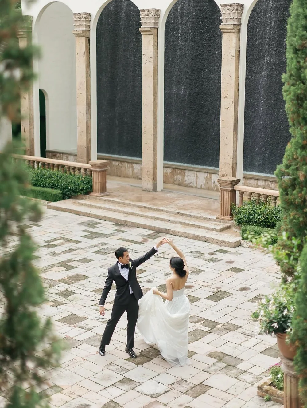 Bride & Groom Enjoying First Dance at our Houston Outdoor Wedding Venue